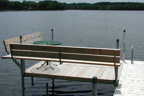 Dock bench and ladder accessory mounted on Lake Minnetonka dock
