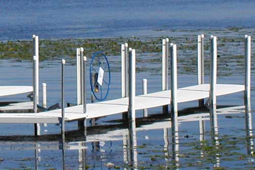 PolyDock bumpers accessory installed on Lake Minnetonka dock to protect boats from impact