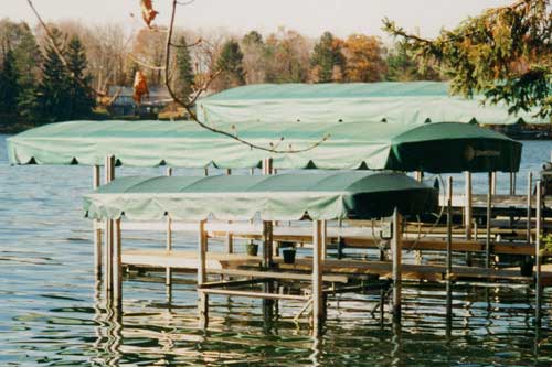 Durable aluminum boat lift installed on Lake Minnetonka dock for safe and easy boat storage