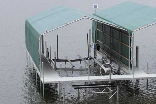Durable aluminum boat lift installed on Lake Minnetonka dock for safe and easy boat storage