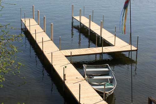 TonkaDock with simple design on a calm lake, ideal for relaxing and lake access